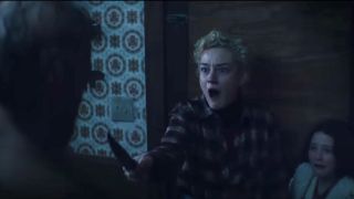 Julia Garner and Matilda Firth startled by a beast in Wolf Man