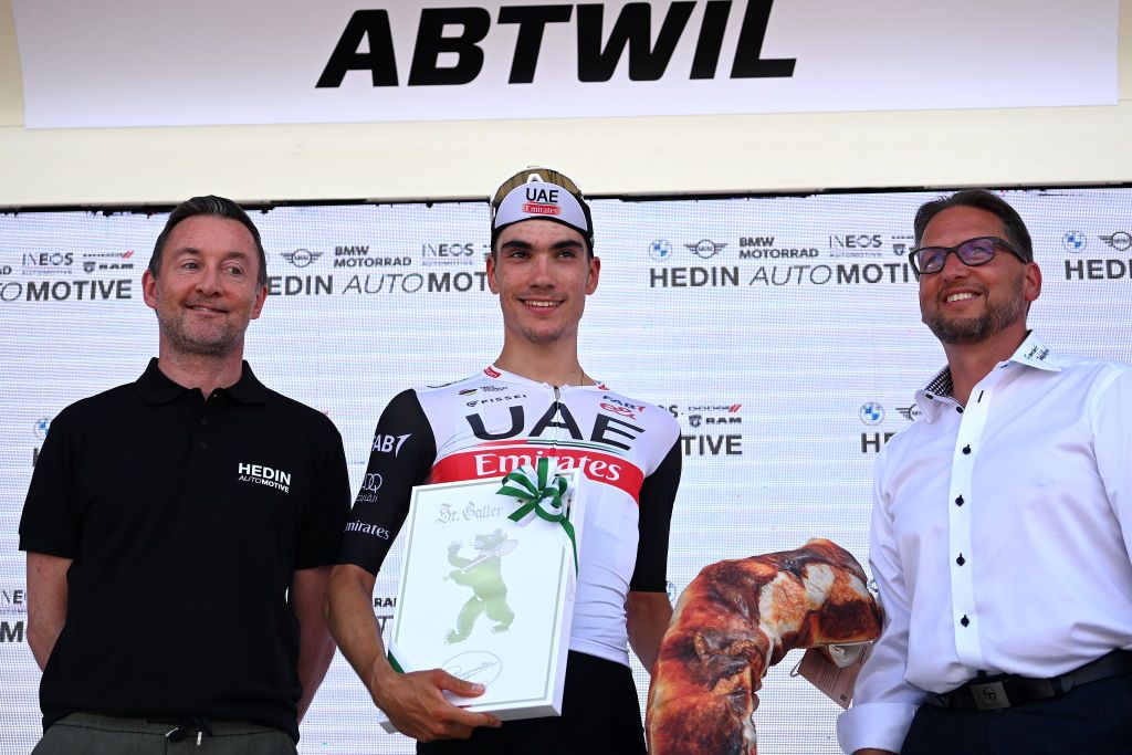 ABTWILL SWITZERLAND JUNE 18 Juan Ayuso of Spain and UAE Team Emirates celebrates at podium as stage winner during the 86th Tour de Suisse 2023 Stage 8 a 257km individual time trial from St Gallen to Abtwil UCIWT on June 18 2023 in Abtwil Switzerland Photo by Tim de WaeleGetty Images