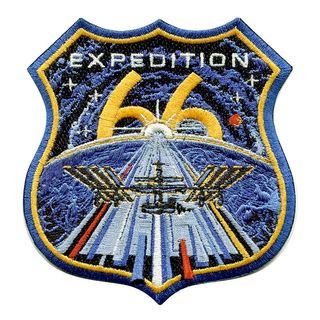 The background of the star field on the International Space Station Expedition 66 patch is styled after the "Kirby Krackle" (or "dots") as used by Marvel artist Jack Kirby to convey energy in space.