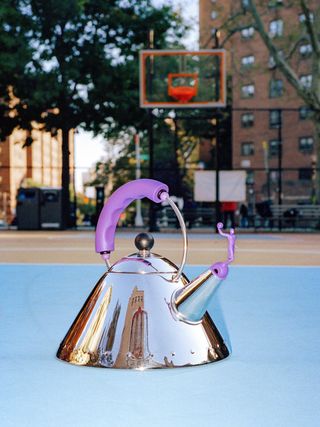 Virgil Abloh Alessi Kettle on basketball court, with basketball player stopper in the spout