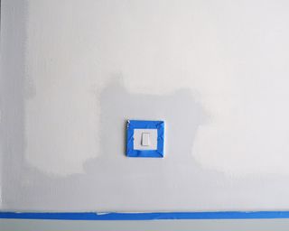 Cutting in while painting a wall