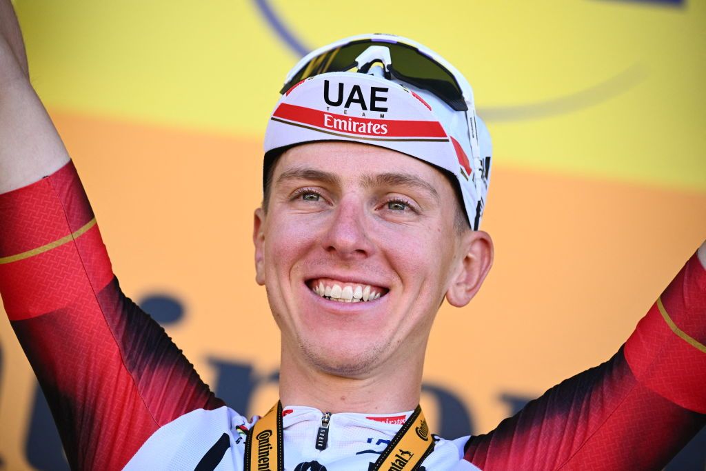 Slovenian Tadej Pogacar of UAE Team Emirates celebrates on the podium after winning stage seven of the Tour de France cycling race a 176 km race from Tomblaine to La Super Planche des Belles Filles France on Friday 08 July 2022 This years Tour de France takes place from 01 to 24 July 2022 BELGA PHOTO POOL JASPER JACOBS UK OUT Photo by JASPER JACOBS BELGA MAG Belga via AFP Photo by JASPER JACOBSBELGA MAGAFP via Getty Images