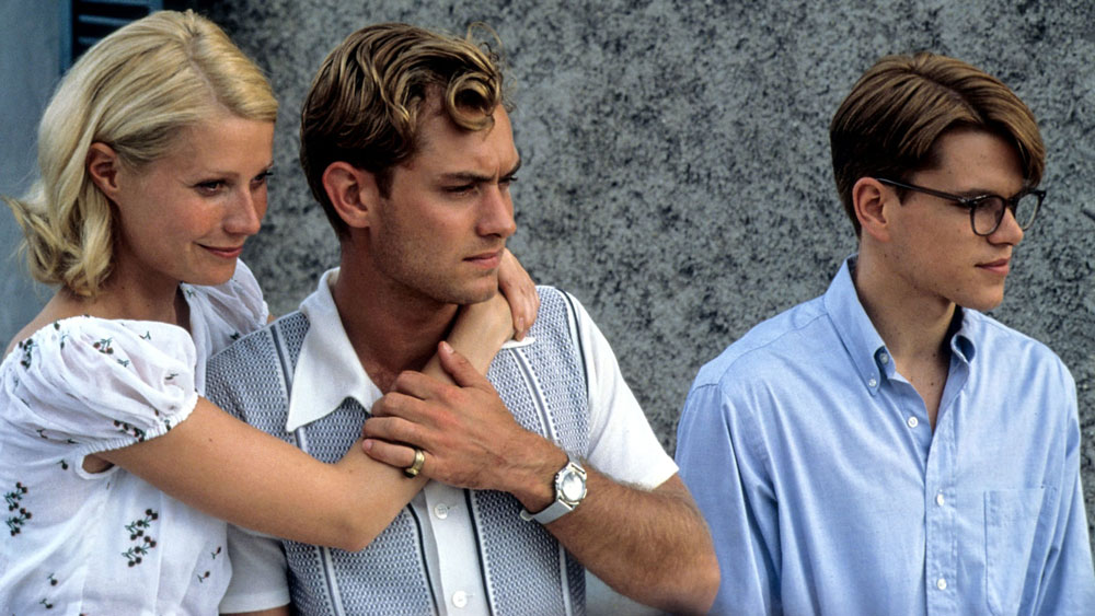 Gwyneth Paltrow, Jude Law and Matt Damon look off camera in a still from The Talented Mr Ripley