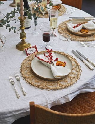 Christmas table setting with berry decoration