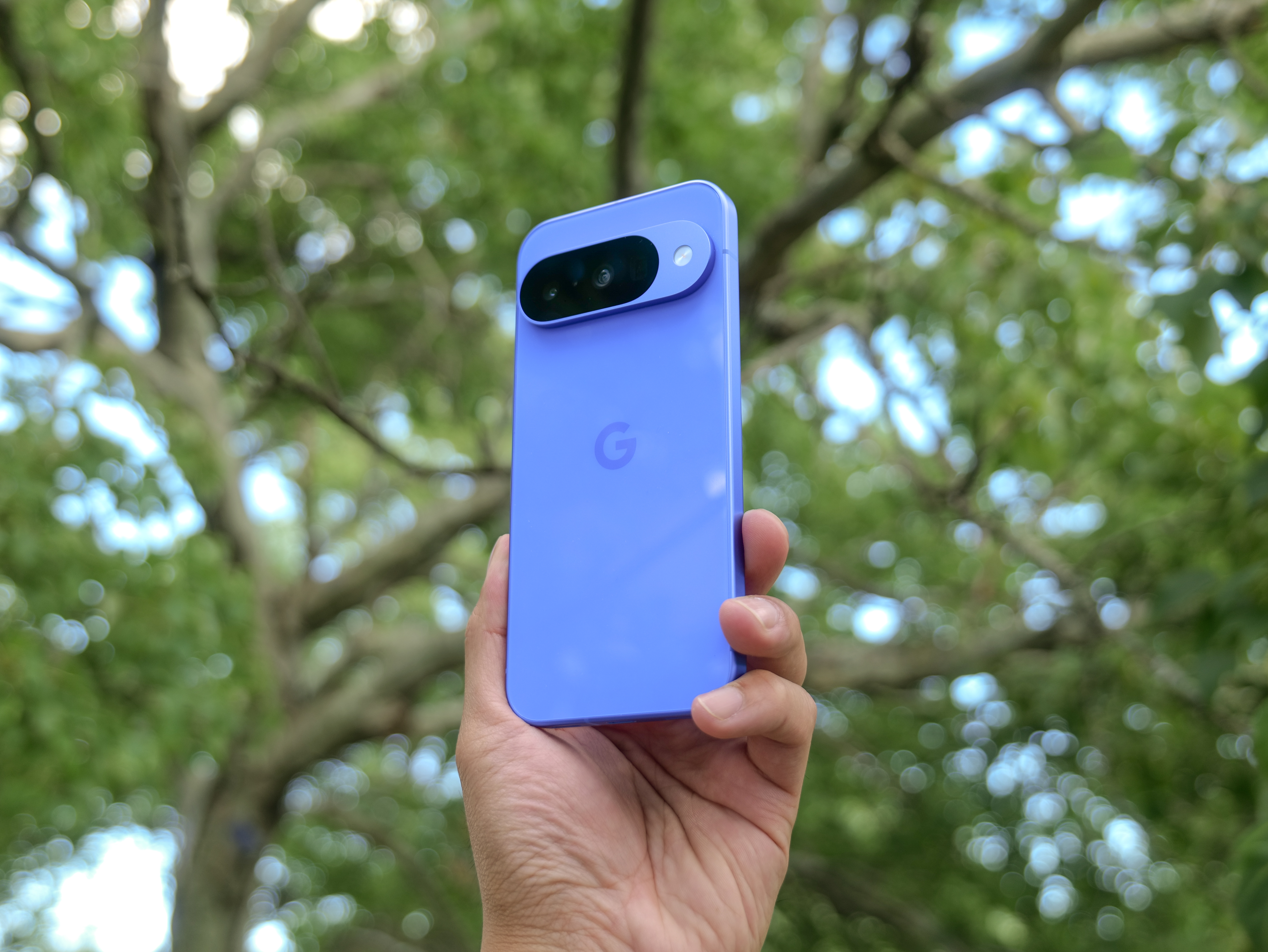 Google Pixel 10 in the hand.
