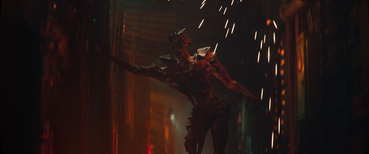 Babiru DaVinci Resolve colour tips; a part human part android figure stumbles down a corridor as sparks drop from the roof