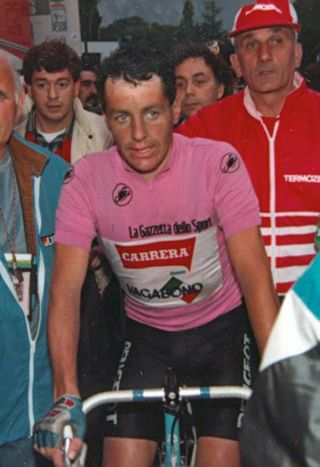 A nervous-looking Stephen Roche resplendent in the pink jersey following stage 17.