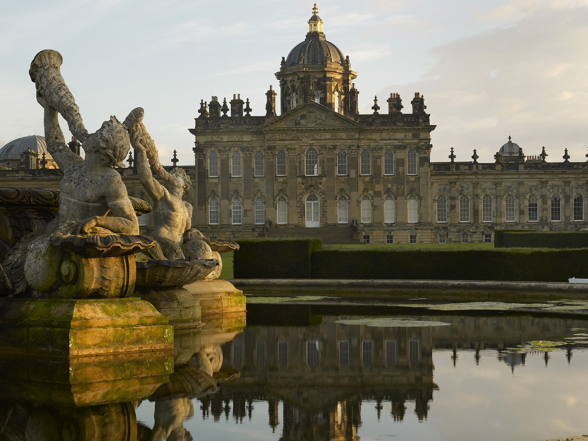 The south front of Castle Howard. To the left is the Atlas Fountain, carved by the sculptor John Thomas and installed in the early 1850s.As pictured in 2011. ©Paul Barker/Country Life Picture Library