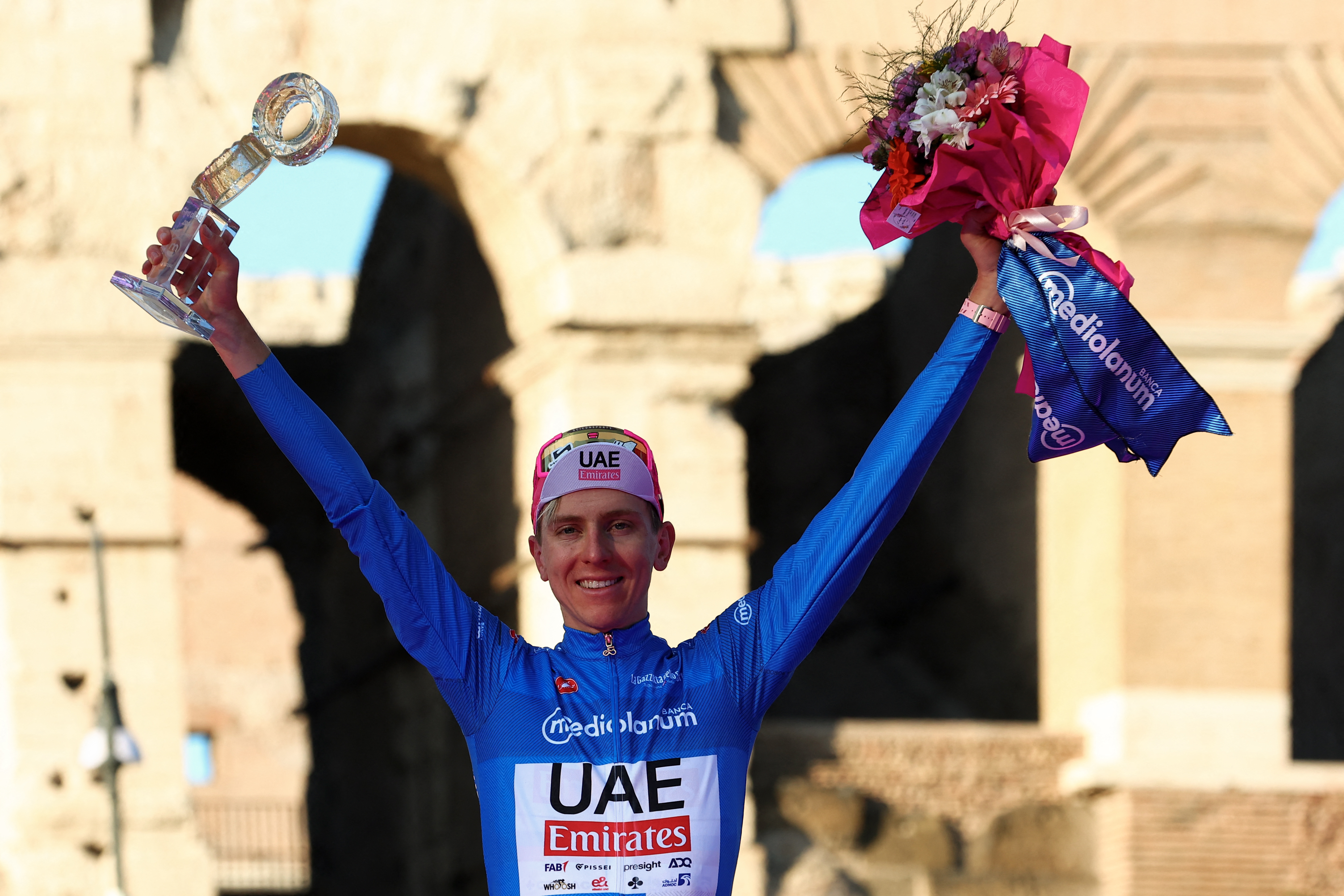 Tadej Pogačar on the podium as the mountains classification winner at the Giro d'Italia 2024