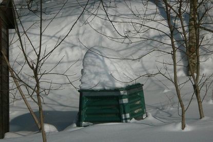 Compost Bin Surrounded And Covered With Snow