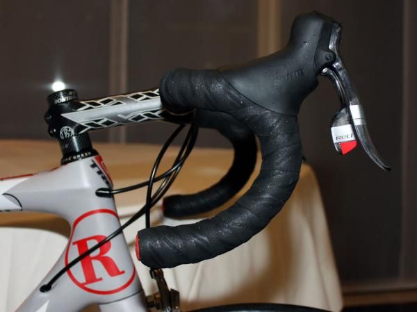 The SRAM Red DoubleTap levers are set high on Armstrong's signature Variable Radius-bend Bontrager handlebars.