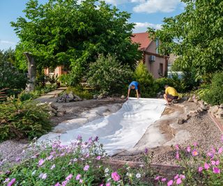 Installing a pond in a backyard