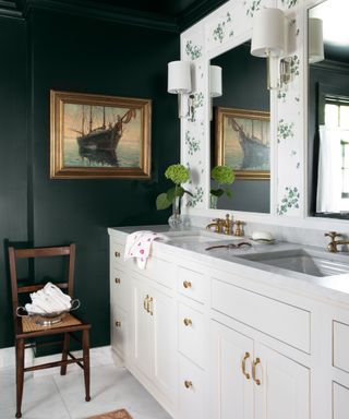 Bathroom with dark gray walls and white vanity unit