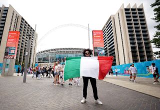 An Italy fan outside Wembley
