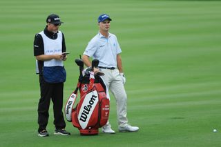 Golfer and caddie pictured on the PGA Tour