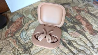 The Dune-colored Beats Fit Pro wireless earbuds from the Kim Kardashian Collection