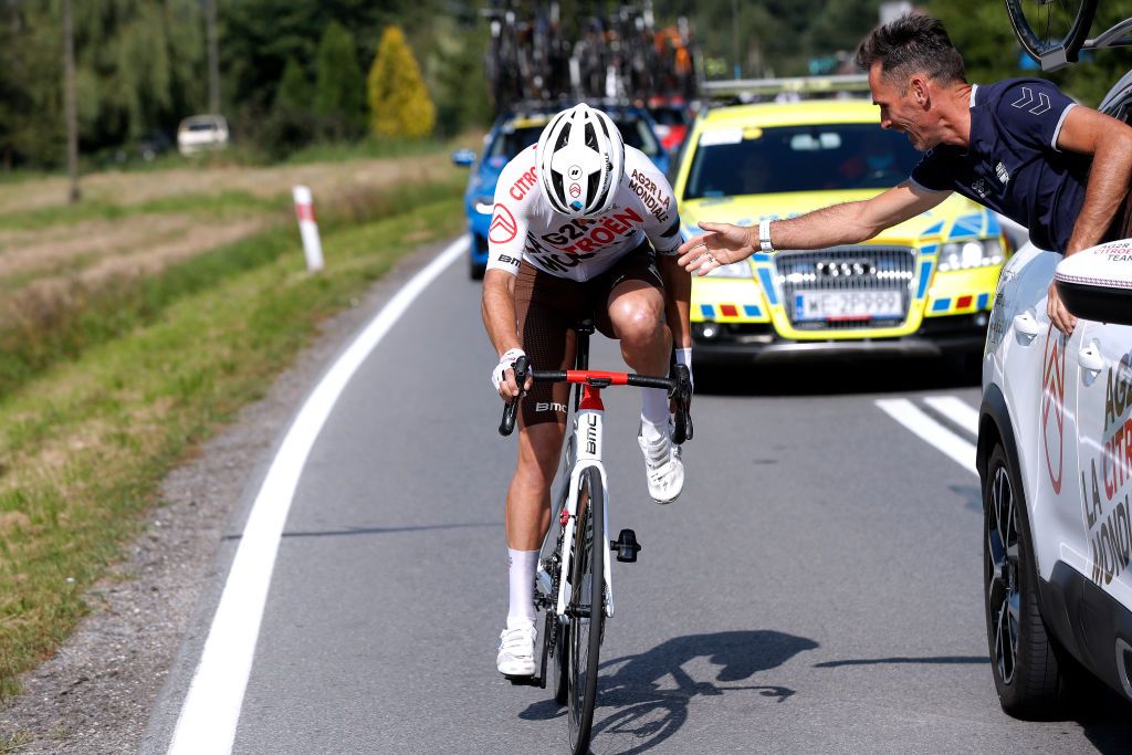 BUKOVINA RESORT POLAND AUGUST 12 Shoe problem detail view of Tony Gallopin of France and AG2R Citren Team assisted by a mechanic during the 78th Tour de Pologne 2021 Stage 4 a 160km stage from Azoty Group Tarnw to Bukovina Resort 924m TourdePologne TDP2021 UCIWT on August 12 2021 in Bukovina Resort Poland Photo by Bas CzerwinskiGetty Images
