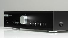 A product photo of the Musical Fidelity B1x1 amplifier on a white surface against a grey background