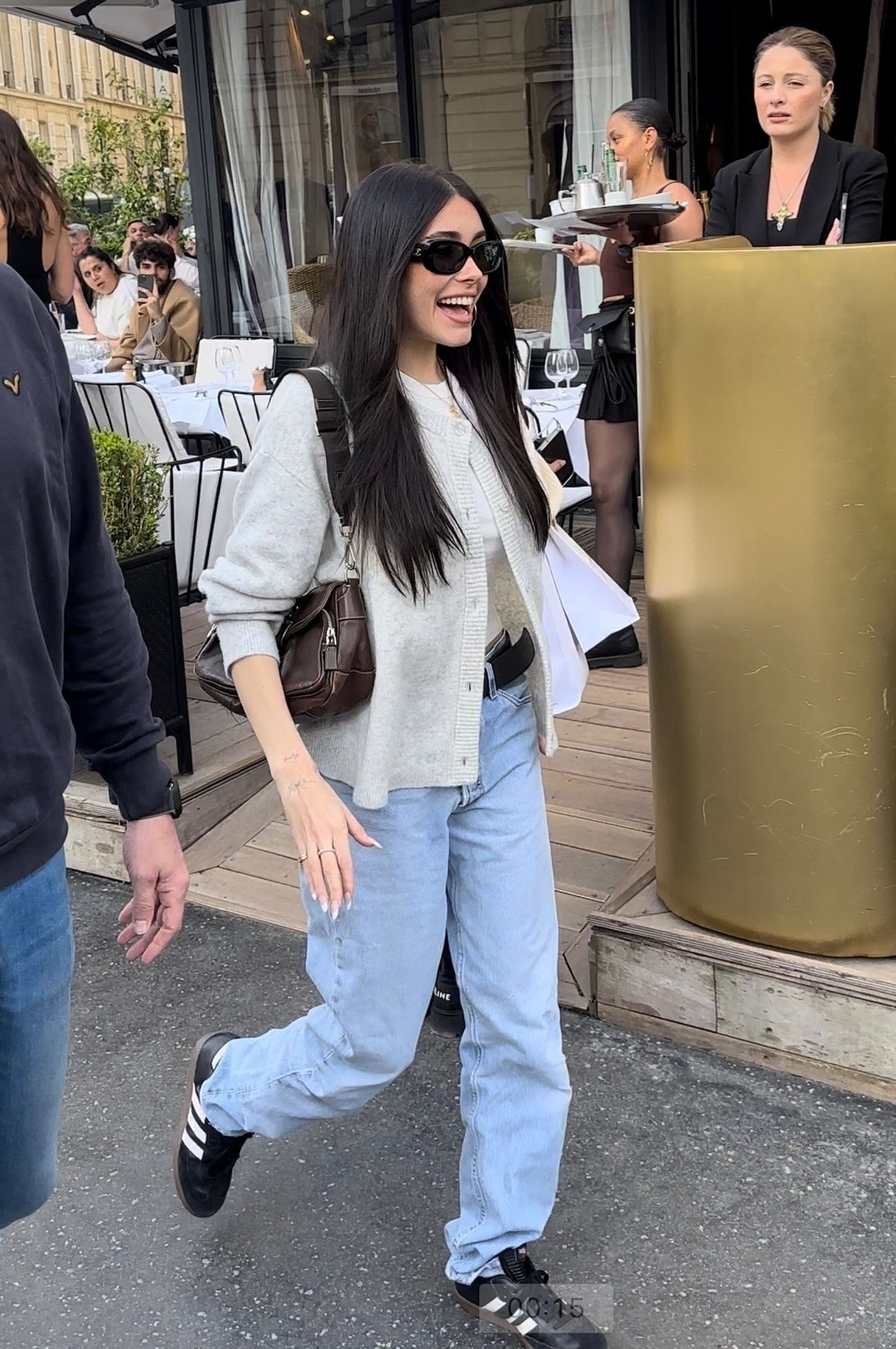 Madison Beer in baggy jeans