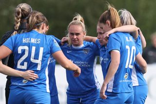 Beth Hepple of Durham Women stands in the huddle during the FA Women's Championship match between Durham Women FC and Birmingham City at Maiden Castle in Durham City, England, on September 29, 2024.