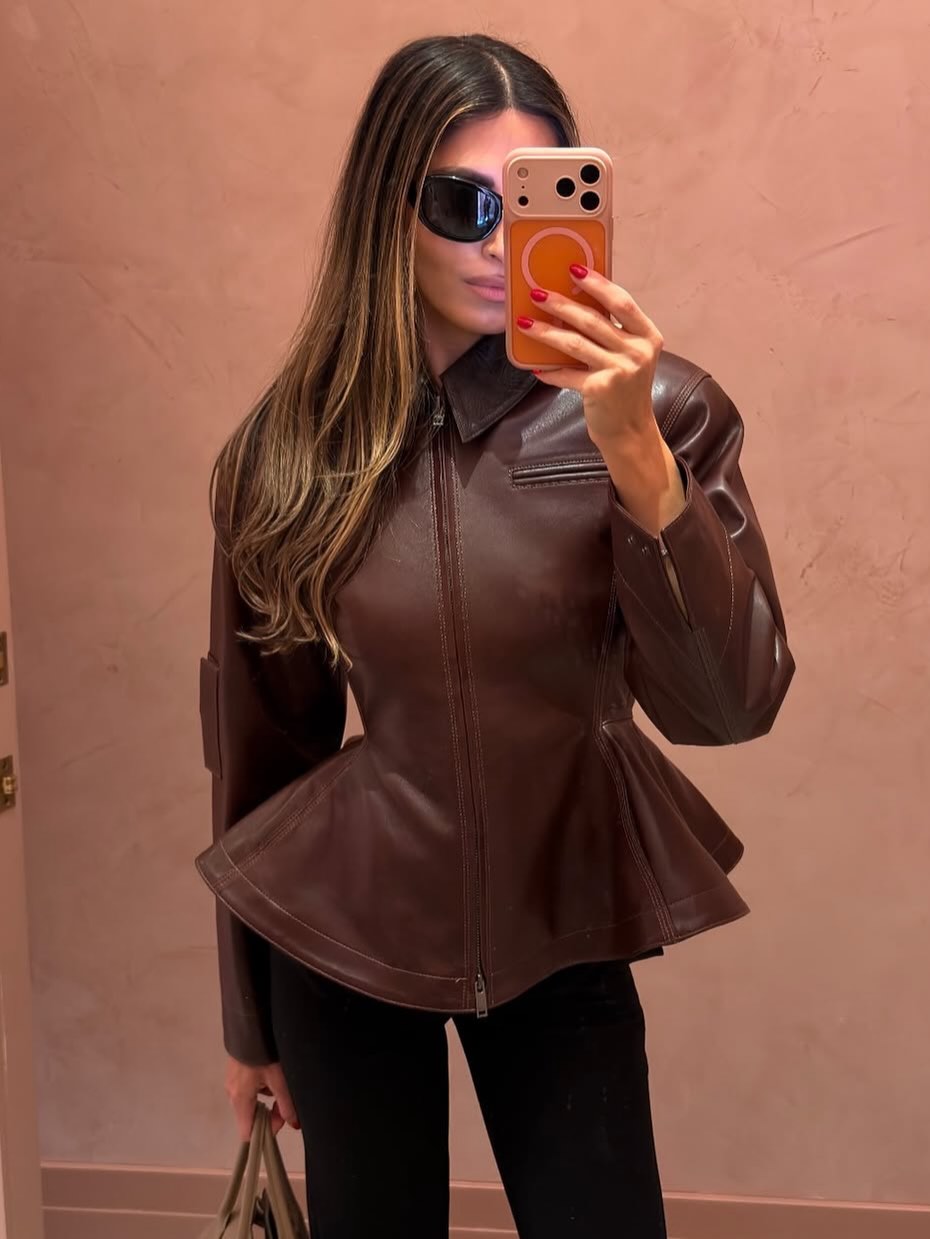 An image of a woman wearing best fitted fall jacket 2026