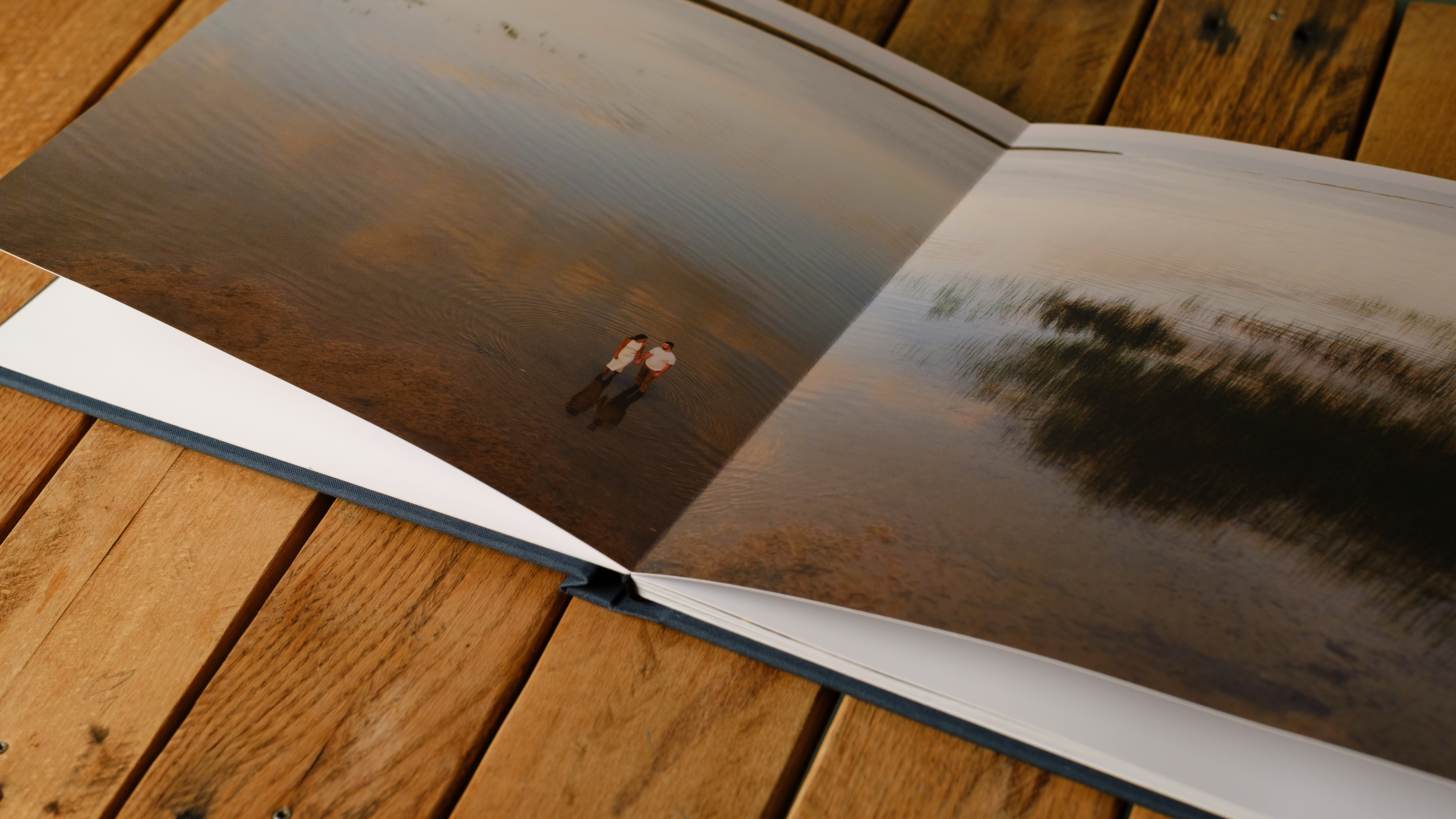 Photo books from Printique on a desktop