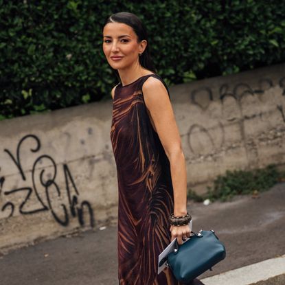 woman wearing a silk brown dress