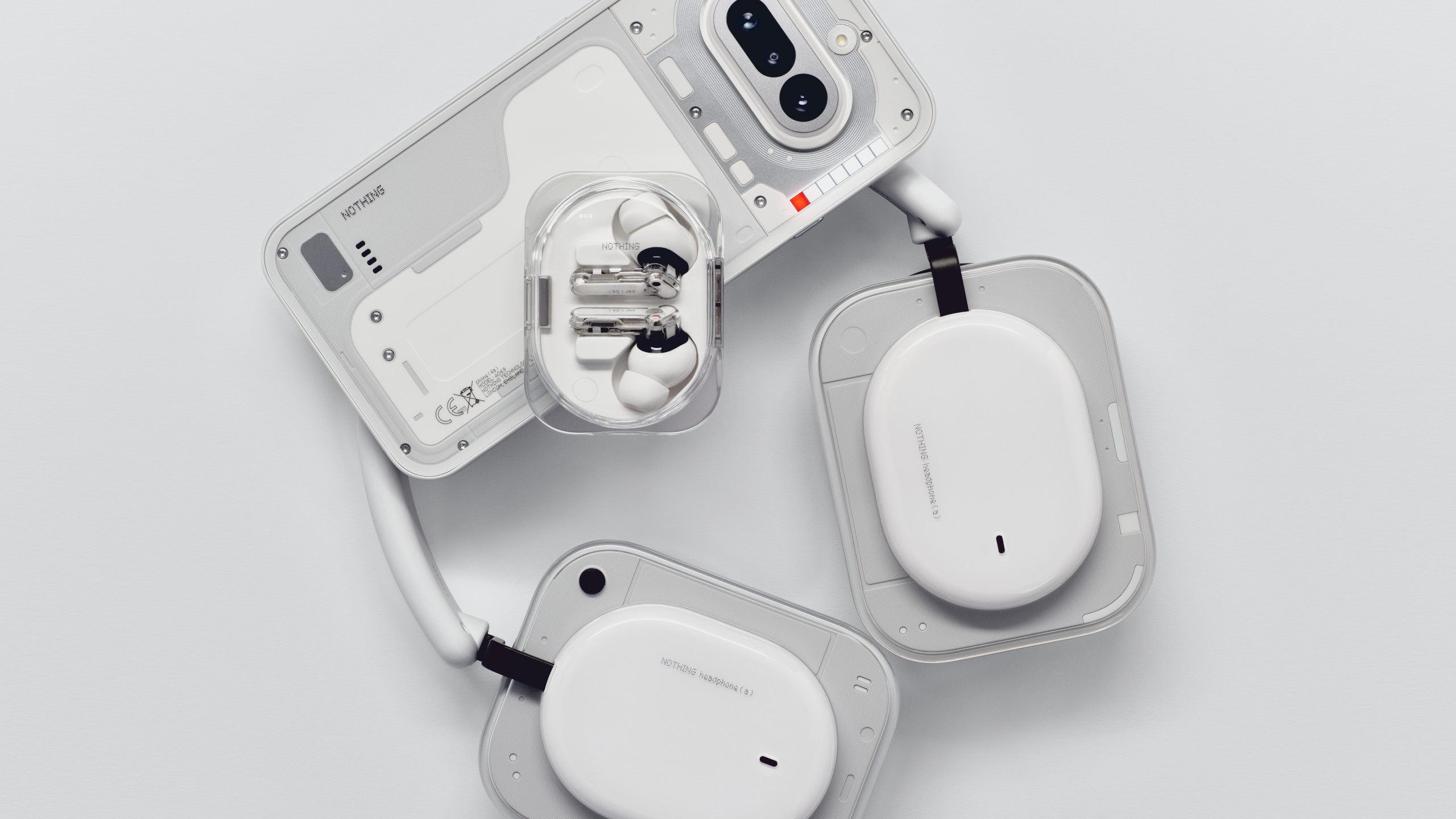 Nothing Phone (4a), Ear (3a) and Headphone (a) in white