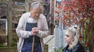 Nina looks troubled as Roy gives her a concerned look.