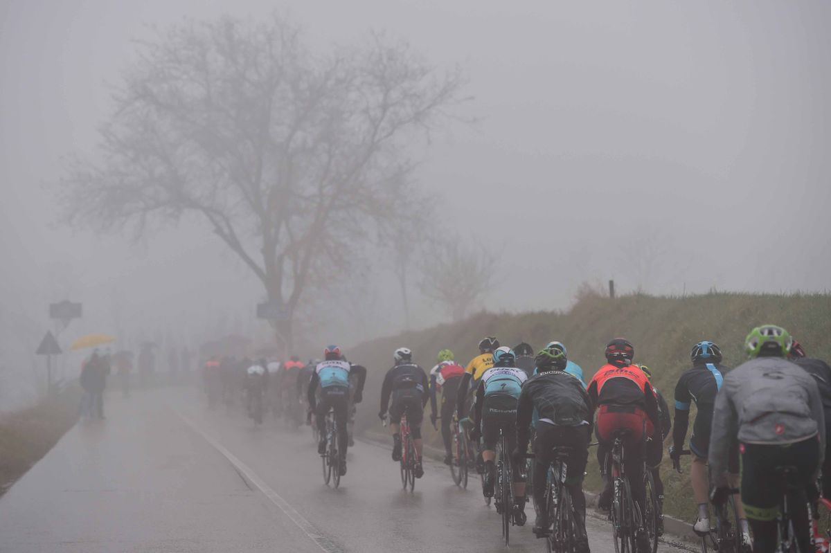 The peloton could barely see ahead in the climb