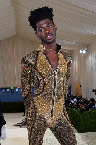 Lil' Nas X was a vision in gold at the Met Gala, wearing Versace