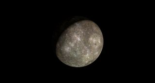 a rocky planet with numerous impact crates visible on the surface, against a black background.