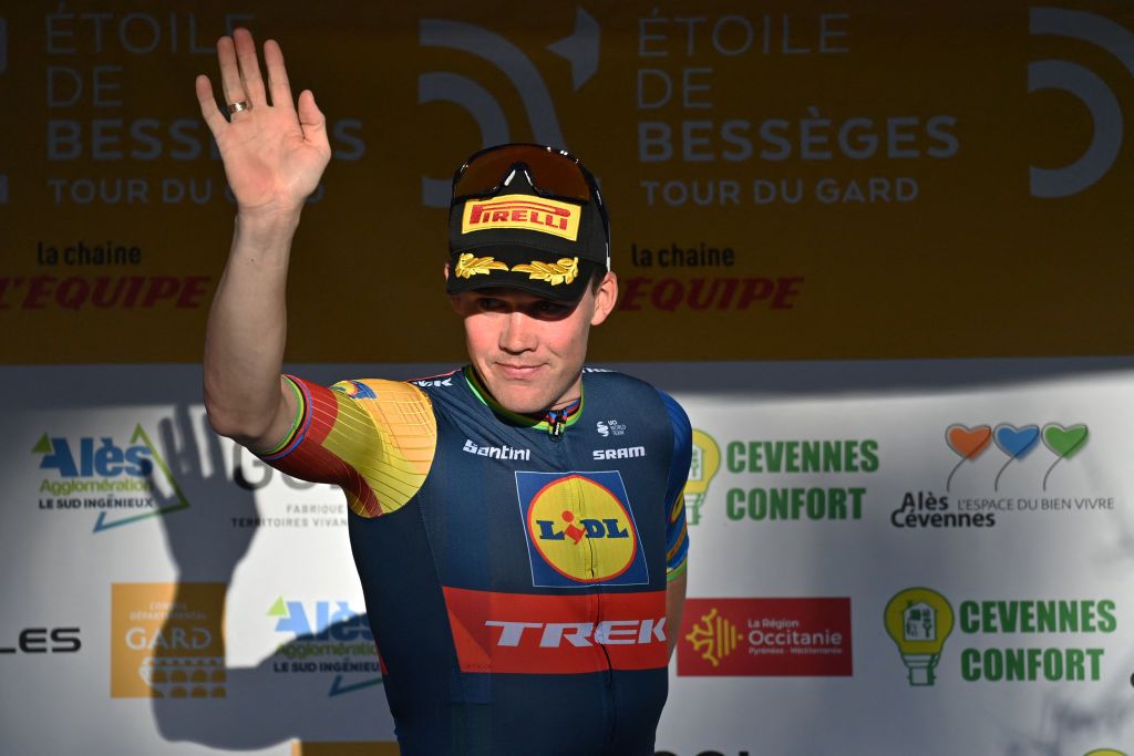 Overall winner, Lidl-Trek team's Danish rider Mads Pedersen celebrates on the podium after the fifth and last time-trial stage departing and finishing in Ales, during the 54th Etoile de Besseges-Tour du Gard cycling race, in Ales on February 4, 2024. (Photo by Sylvain THOMAS / AFP)