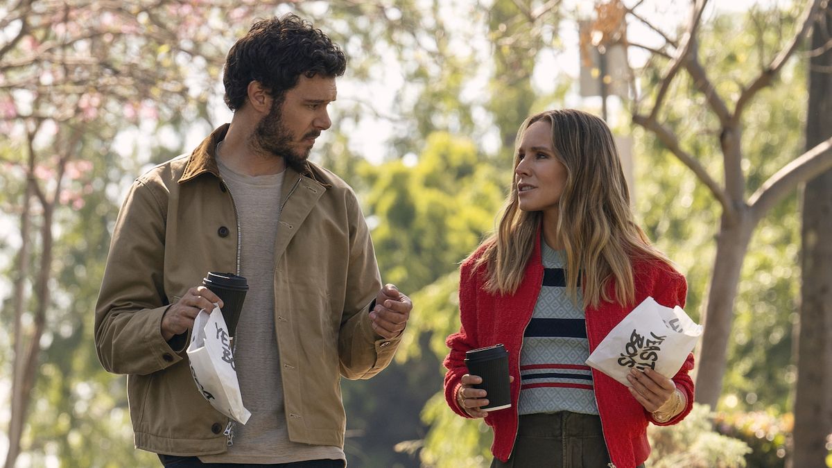 Noah and Joanne walking in park holding food in Nobody Wants This finale