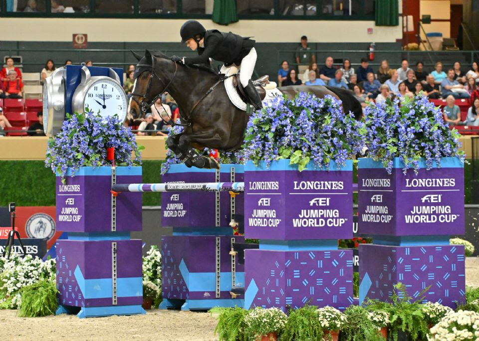 Katie Dinan wins the World Cup qualifier at the Washington International Horse Show
