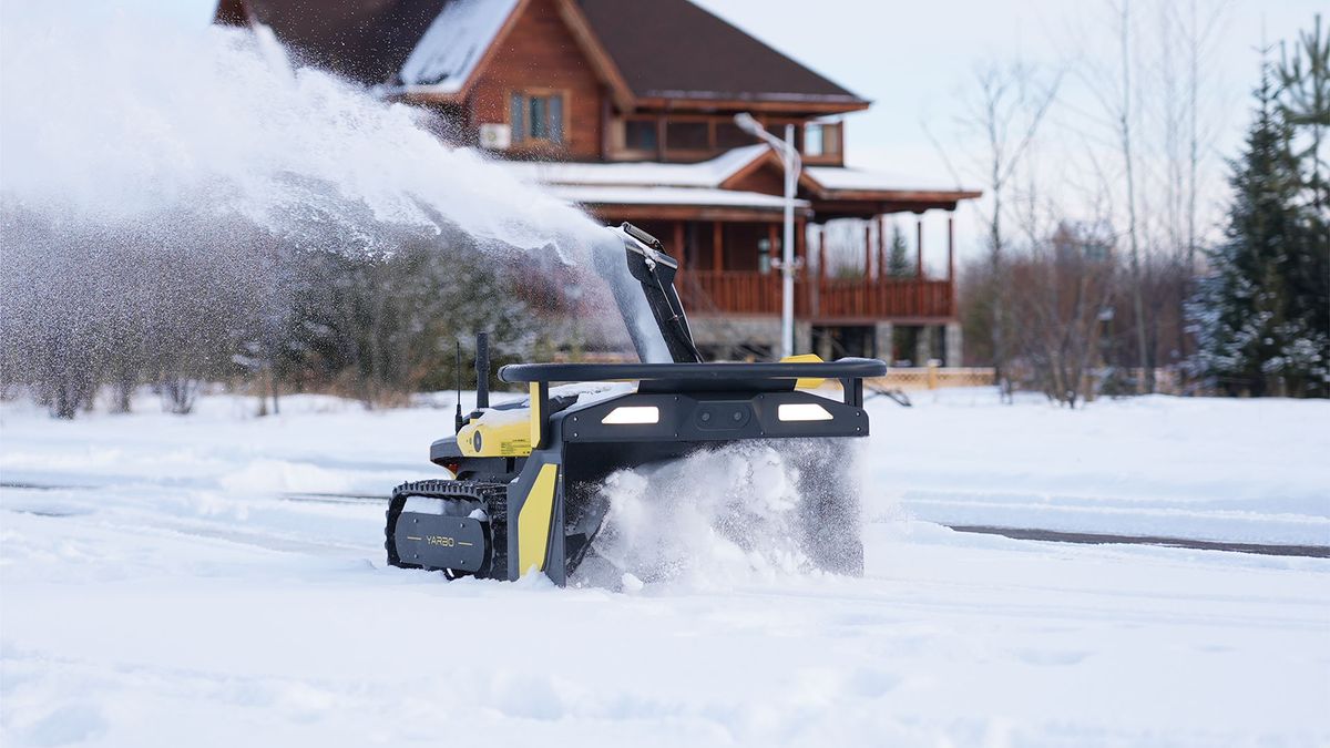 Yarbo lawn bot in snow blower mode