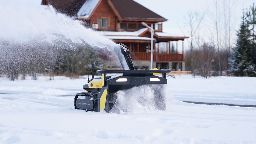 Yarbo lawn bot in snow blower mode