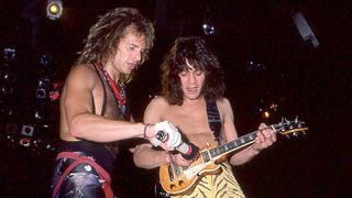 David Lee Roth and Eddie Van Halen onstage in 1984, with Eddie playing his miniaturized Les Paul