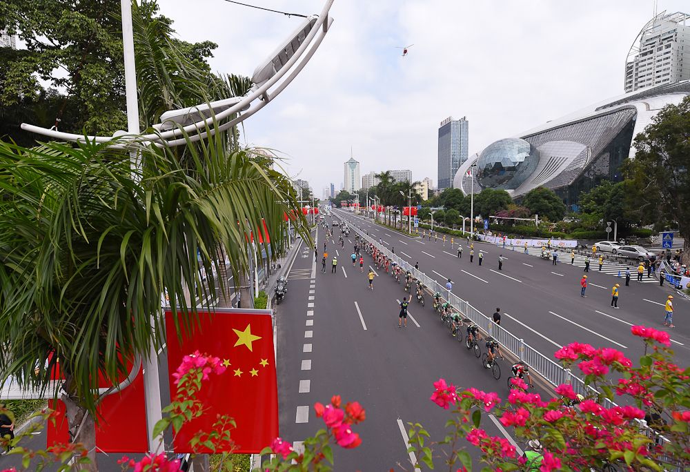 The peloton goes through the feedzone during stage 3 at the Tour of Guangxi