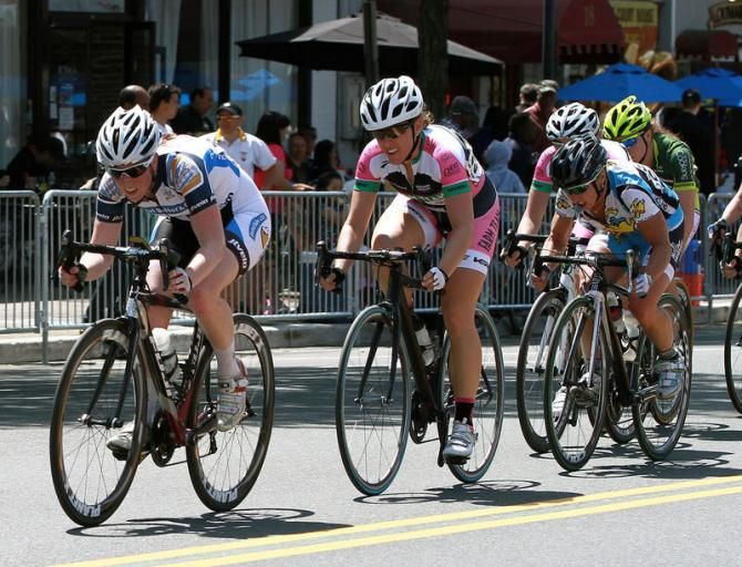 Laura Van Gilder (Mellow Mushroom) tries to convince Raquel Miller (Farm Team Elite Women&rsquo;s Cycling) to chase the break down