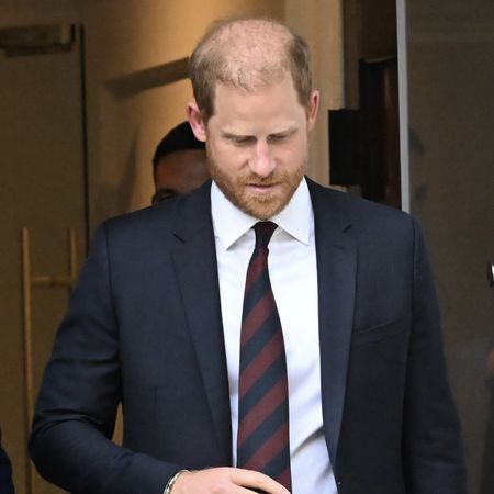 Prince Harry in a dark suit and tie