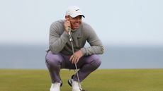 Rory McIlroy of Northern Ireland smiles whilst lining up a putt during day two of the Alfred Dunhill Links Championship 2024 at Kingsbarns Golf Links on October 04, 2024 in St Andrews, Scotland.