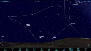 Just after 7 p.m. EST on Feb. 26 (0000 GMT on Feb. 27), Mars will pass within 34 arc minutes (close to the moon's diameter,which is about 2,160 miles or 3,500 kilometers) to the upper right of blue-green Uranus. The two planets should fit together in the field of view of a low-power eyepiece, regardless of the telescope. For a reference to help you find them, Venus will be about 11 degrees to their lower right. (Your clenched fist held at arm's length equals roughly 10 degrees.)
