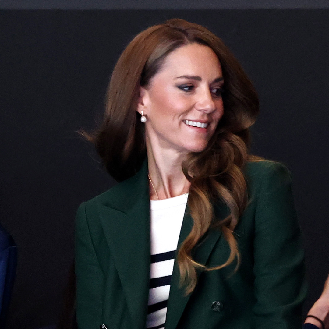 Princess Kate has long curly brown hair and is wearing a Breton striped sweater with a dark green Ralph Lauren blazer at the Commonwealth Games 2026