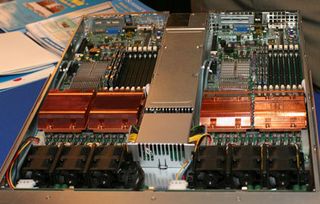 SuperMicro busts out with 16 cores in one chassis. This 1U rack server has two separate computers powered by a single 900 watt PSU. Each computer can hold up to two quad-core Xeon processors.