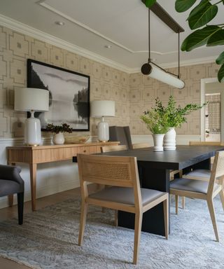 dining room with dark table and light wood chairs