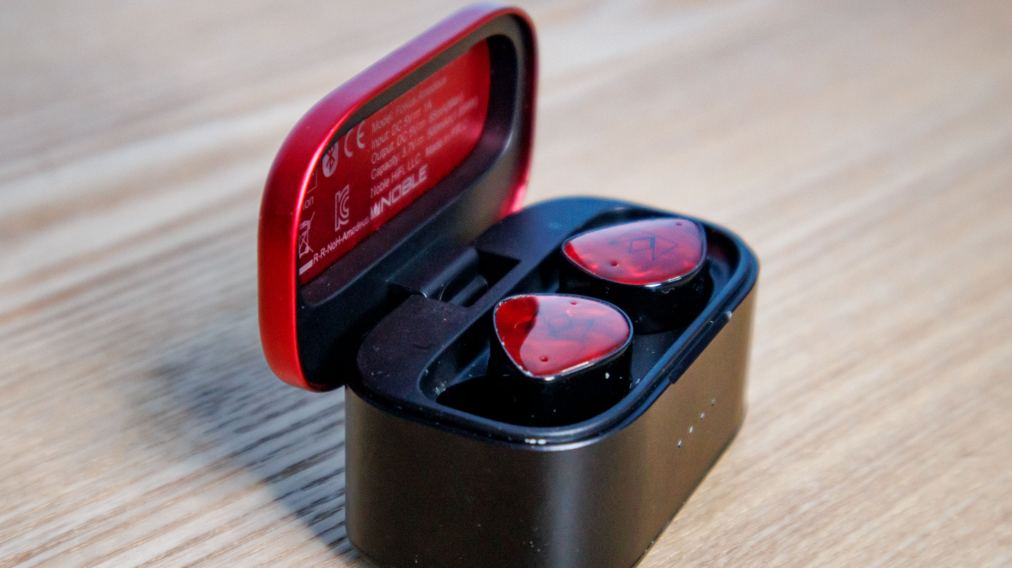 Noble Fokus Amadeus on a wooden surface with the lid open