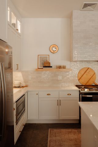 A kitchen with zellige tiling