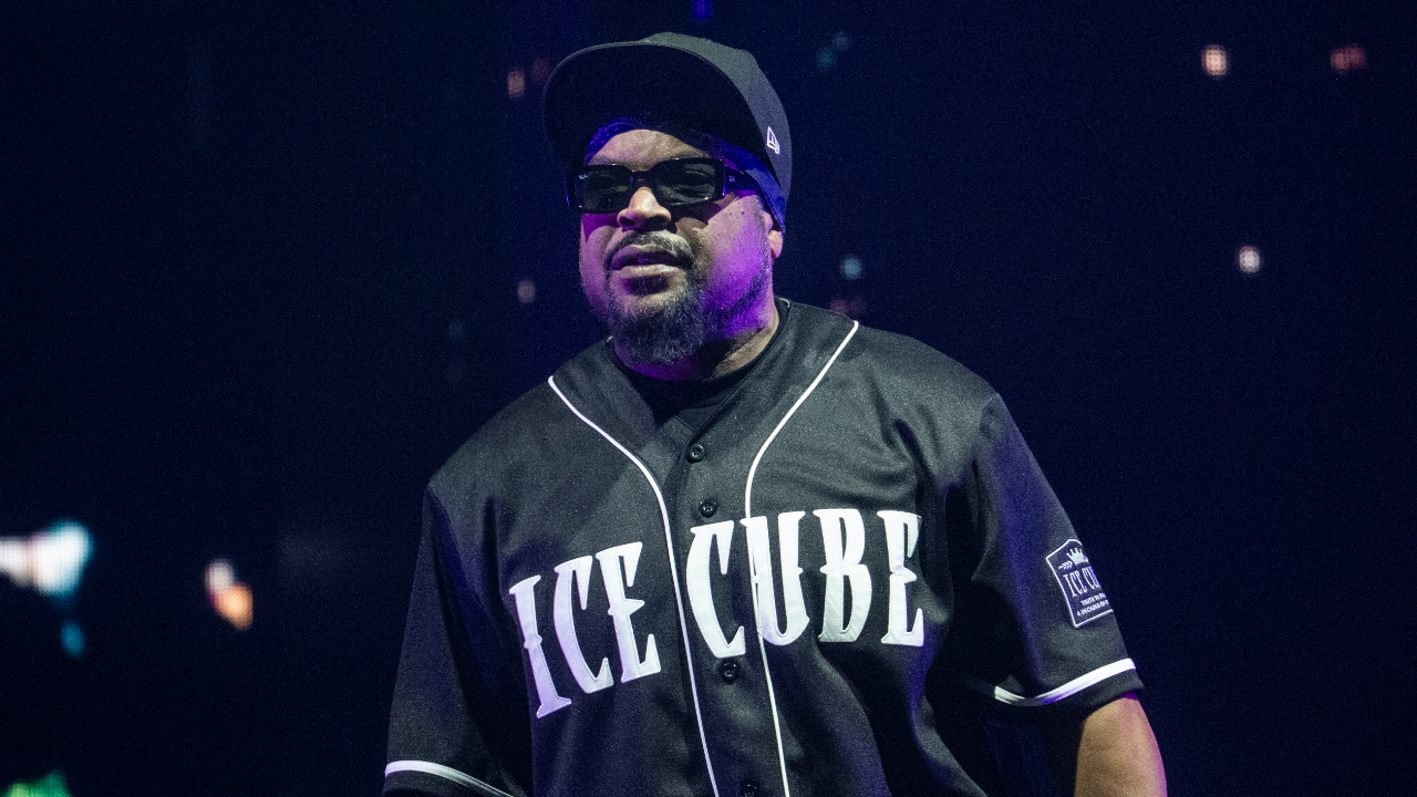 Ice Cube on stage in sunglasses