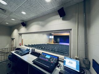 A Chamsys QuickQ30 Console and three Doug Fleenor Designs Preset 10 Stations allow for control in the booth and around the room.